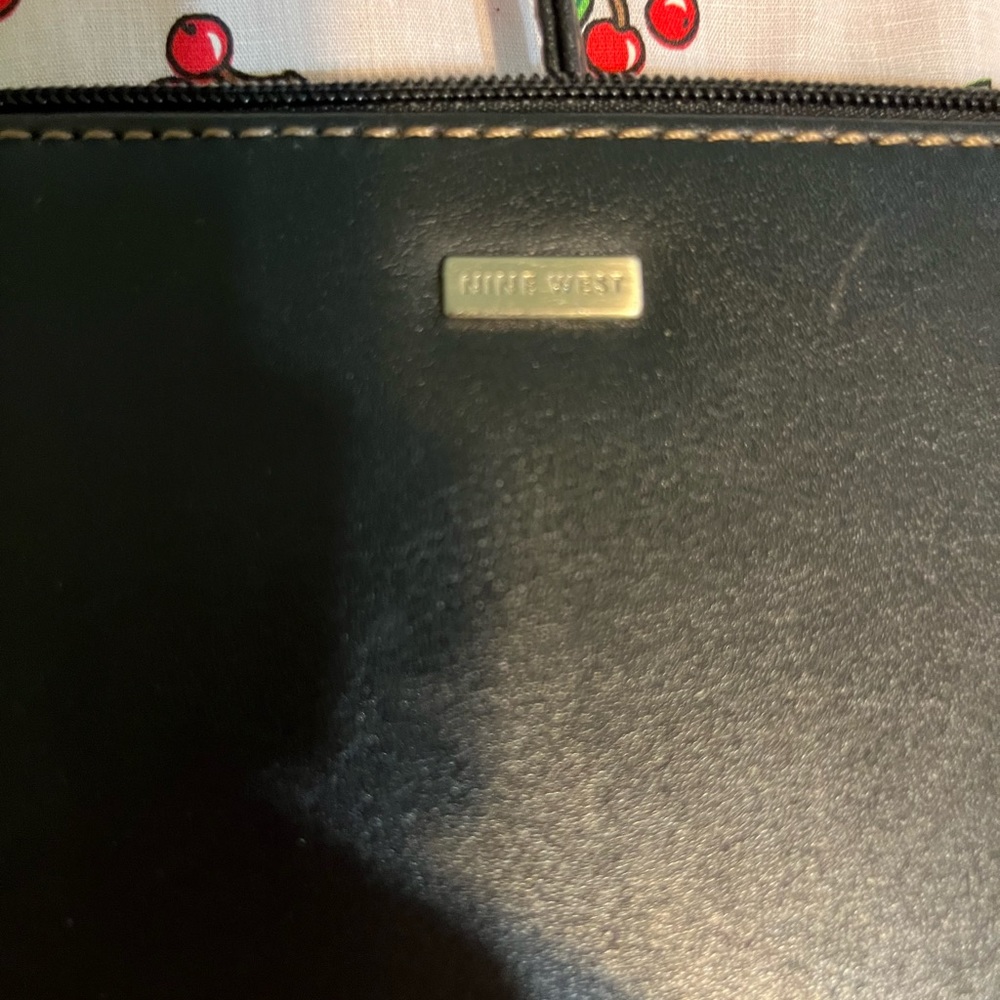 Nine W. clutch. Man-made materials. Black.